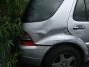 Dented rear side panel following accident